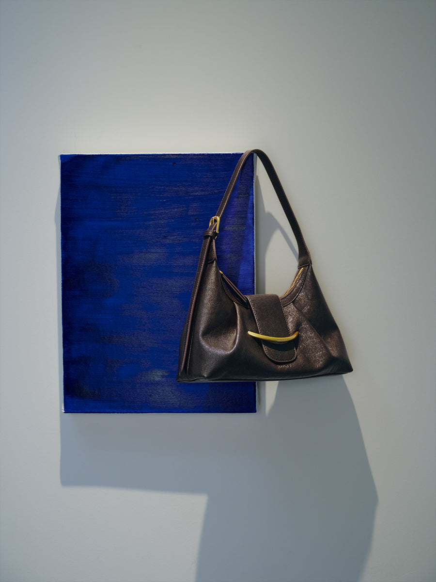 Crescent-shaped delicate hobo bag