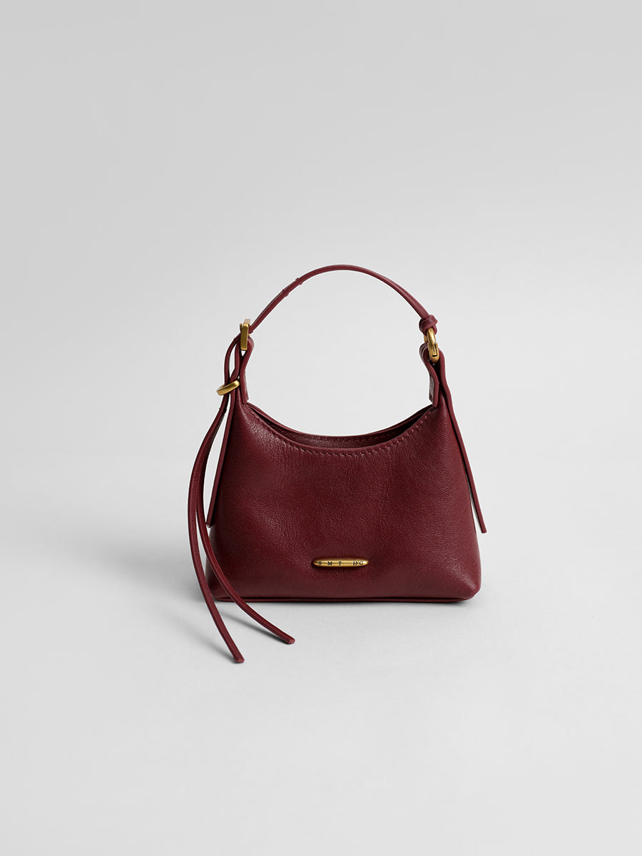 First-layer cowhide mini handbag
