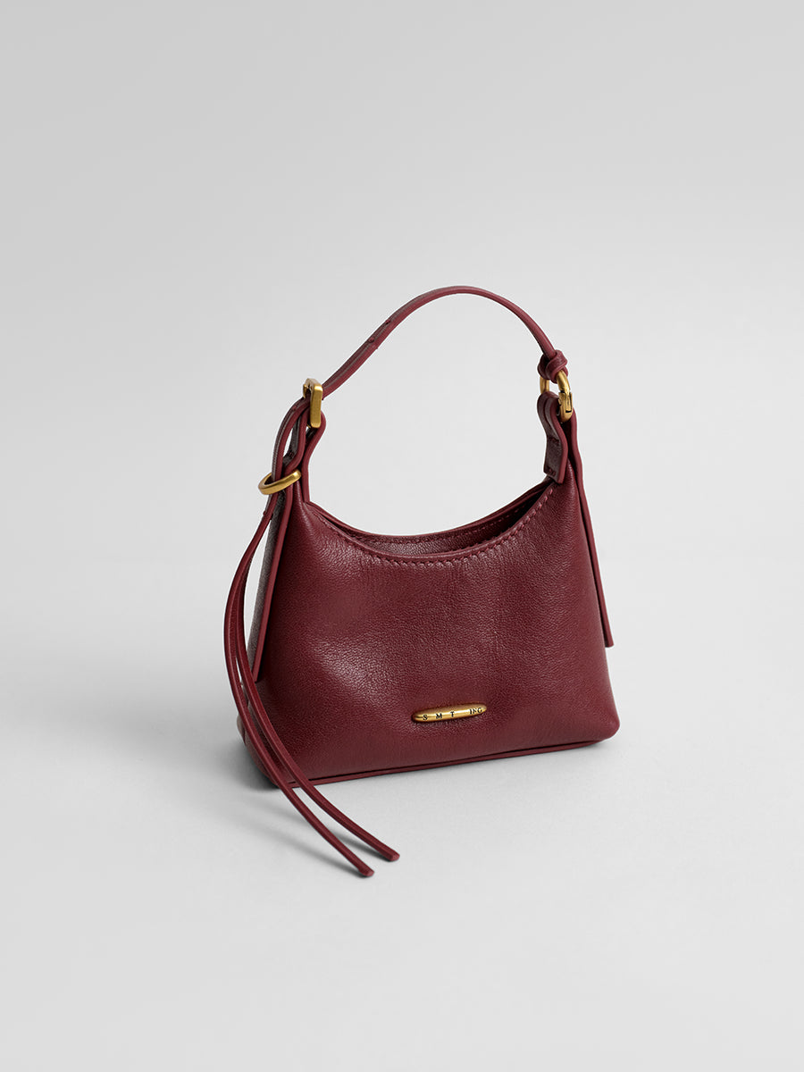 First-layer cowhide mini handbag