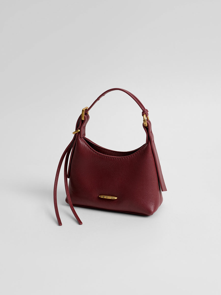 First-layer cowhide mini handbag