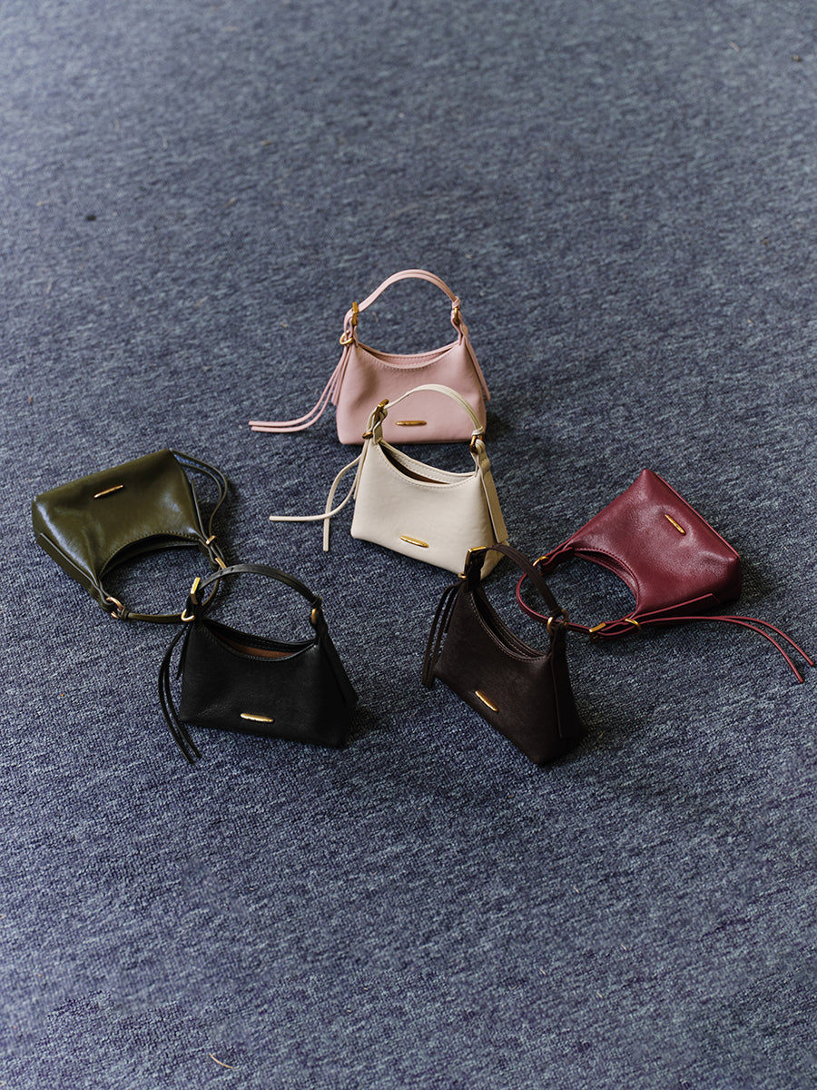 First-layer cowhide mini handbag