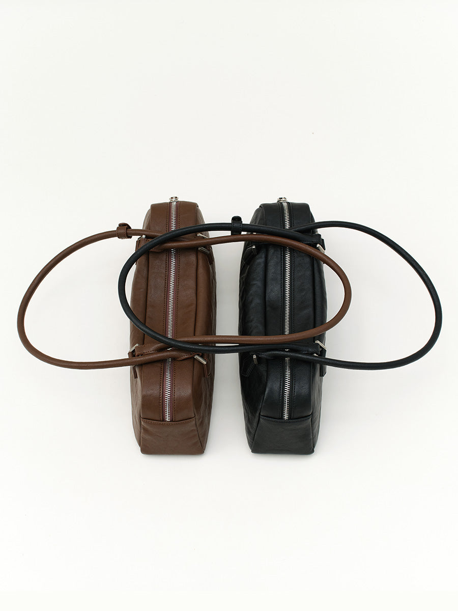 Fashionable and unique pleated baguette bag