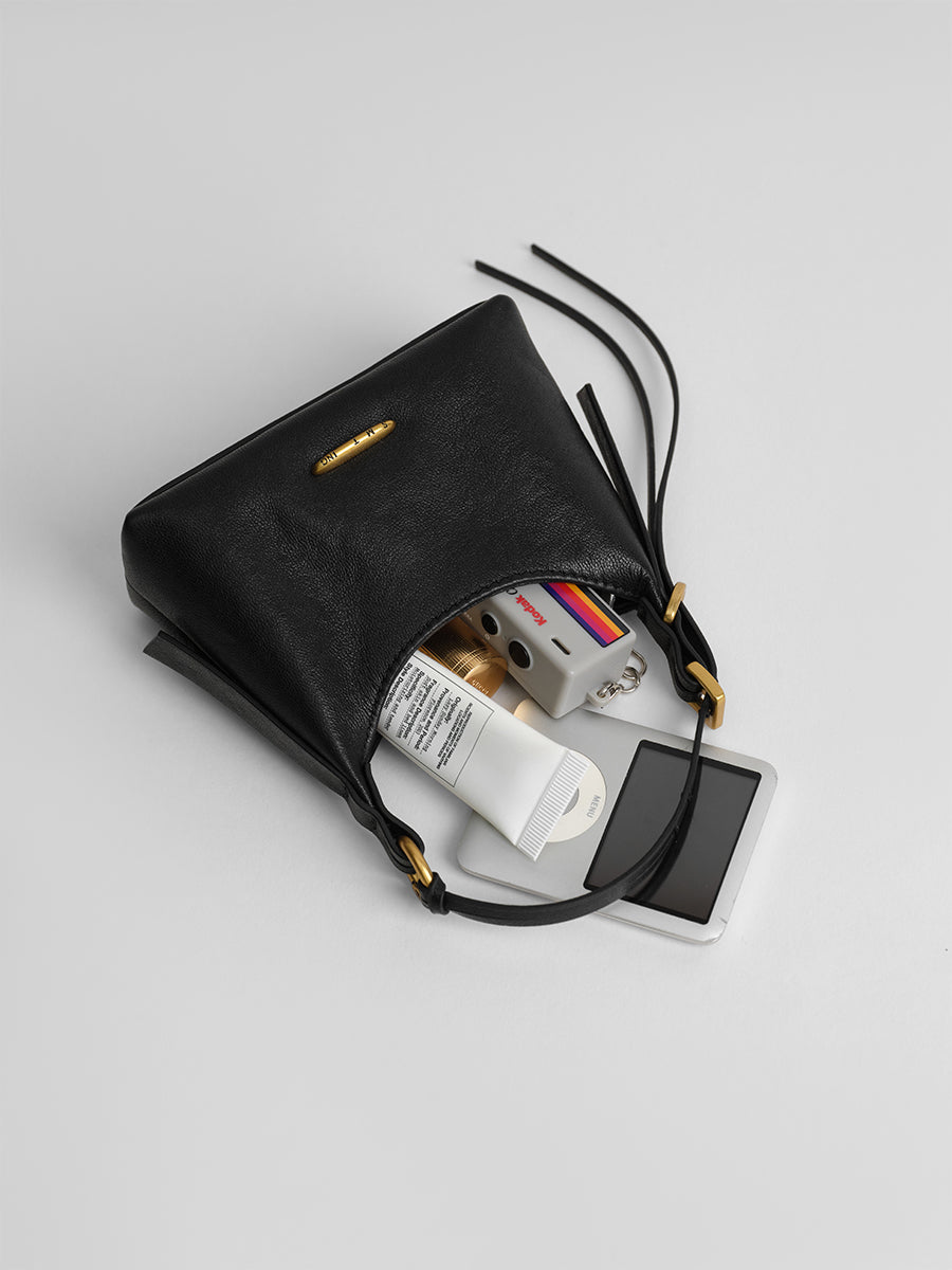 First-layer cowhide mini handbag