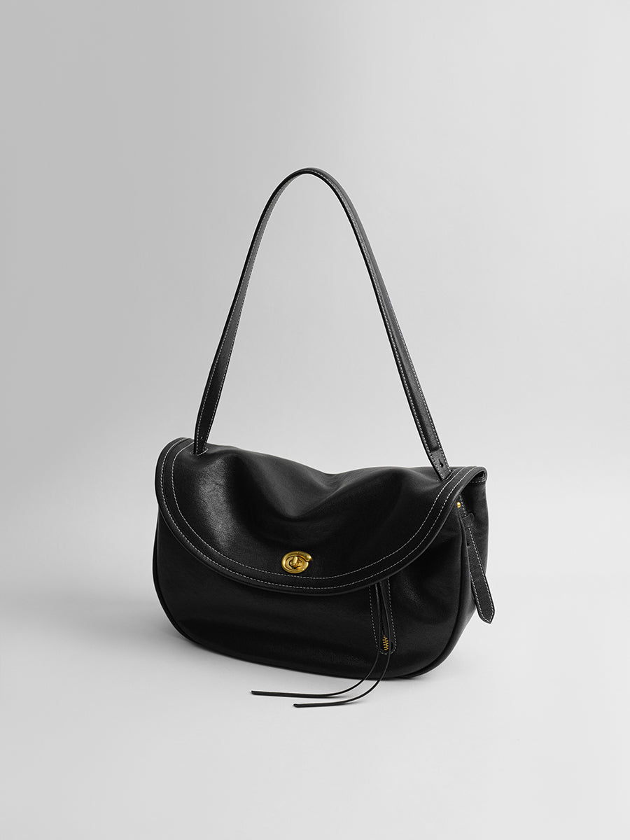 Design-conscious luxury underarm bag