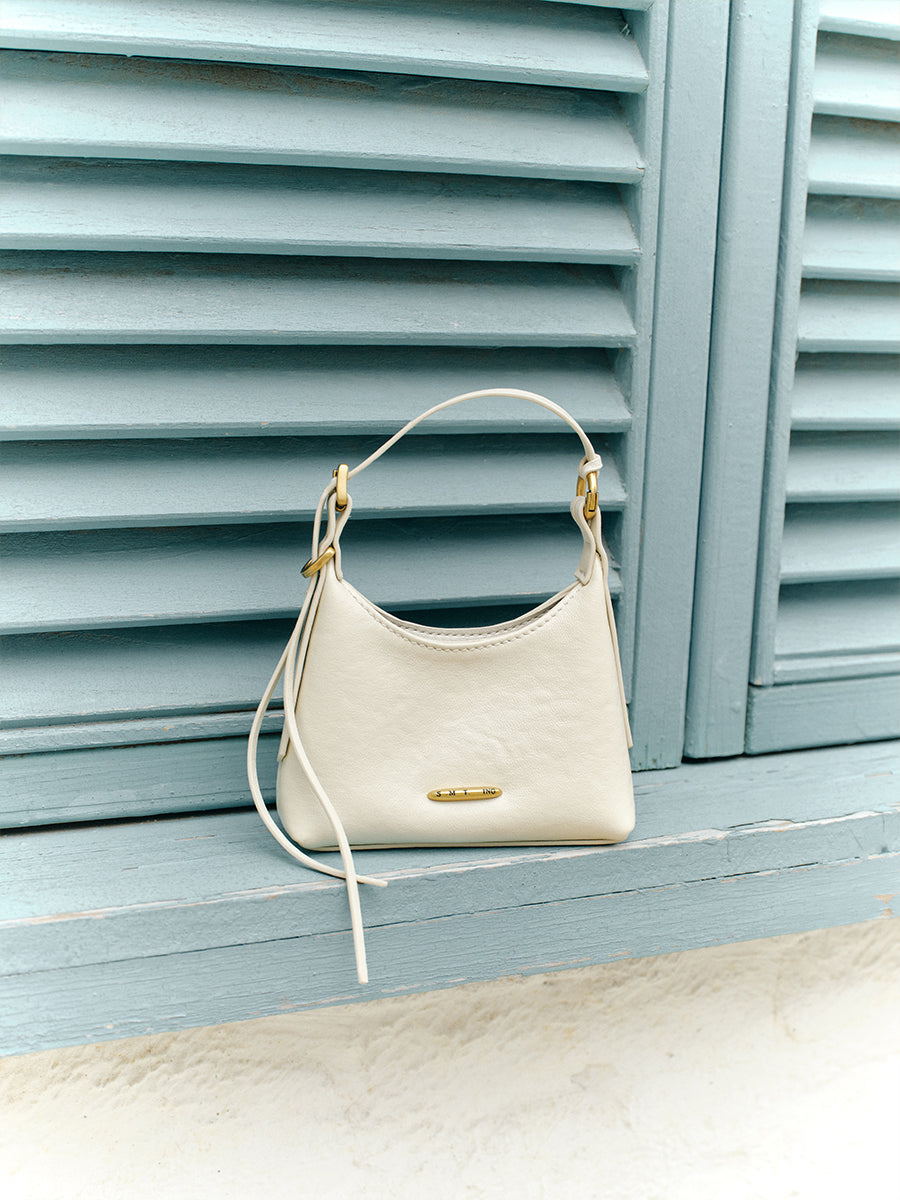 First-layer cowhide mini handbag