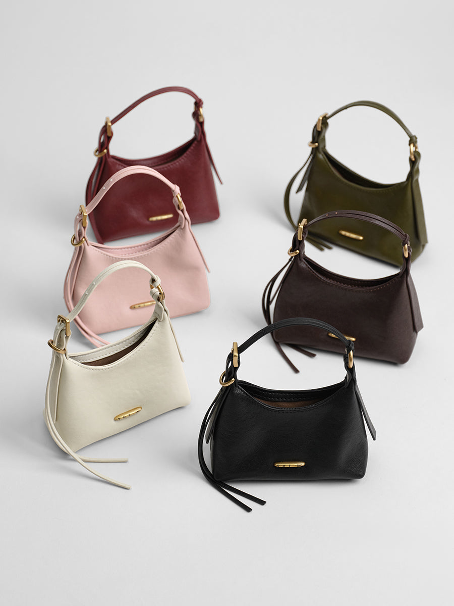 First-layer cowhide mini handbag