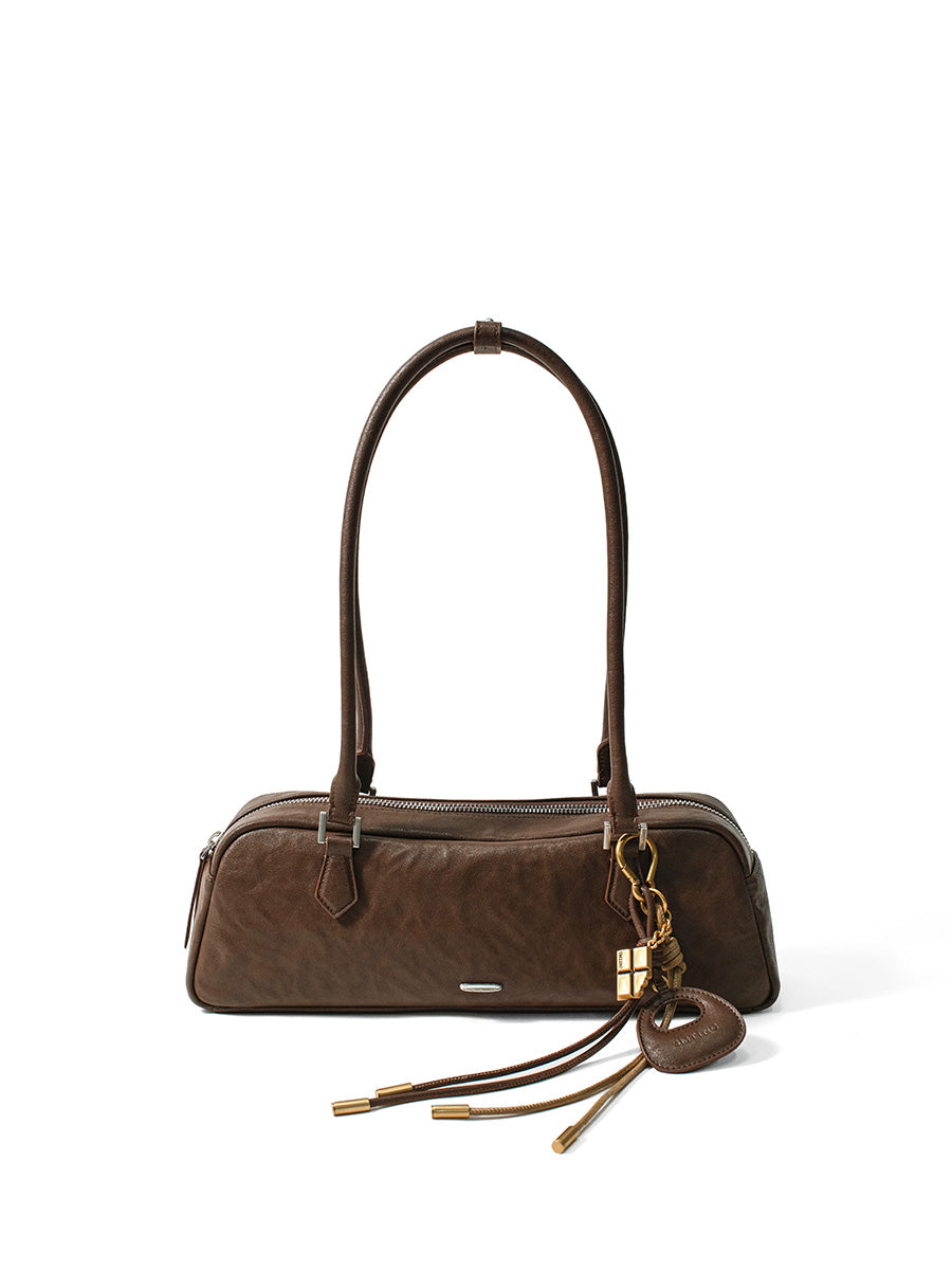 Fashionable and unique pleated baguette bag