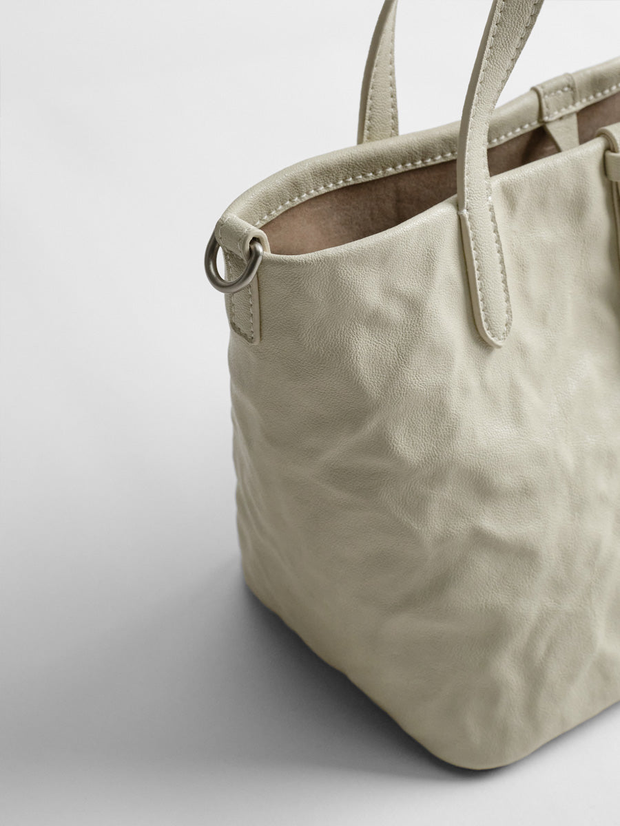 Niche single-shoulder hand-carry bucket bag